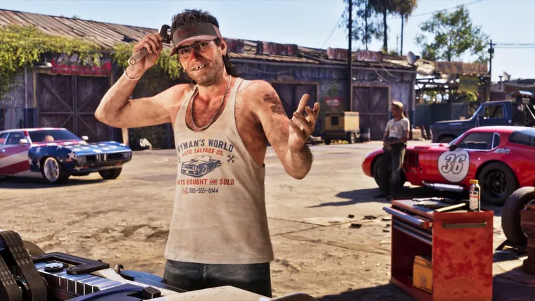 Wyman, his wrench, and a yard full of muscle. Parts bought and sold.