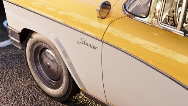 Stanier written in cursive on the front wing of a yellow over cream two-tone, above whitewall tyres branded Ballour, a chrome hubcap, a bullet wing mirror and a skirted rear arch. Every one of those is mid-1950s American, which supports reading this as a 1955-era Crown Victoria rather than the modern police Stanier.