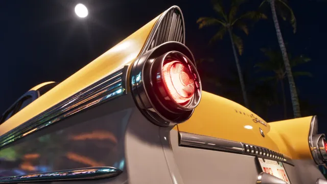 A hooded round tail light lit red in a chrome-speared fin, palms and a full moon behind. The number plate below it reads LEONIDA across the top. Put beside the Cheetah's plate, that gives the whole design: LEONIDA above, GOODTIME STATE below, an orange in the middle.